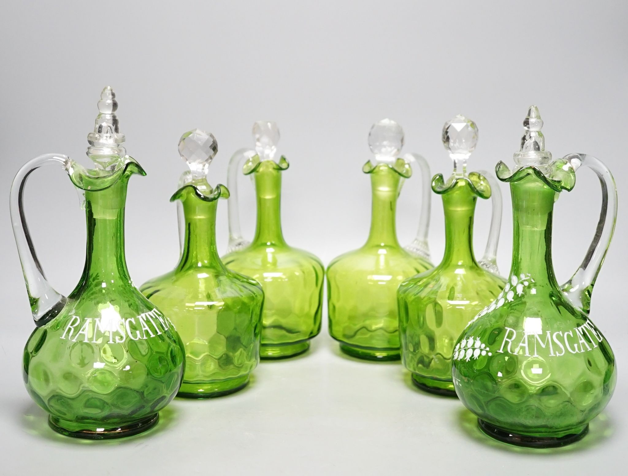 A group of six Victorian green glass decanters, including pair of Ramsgate souvenirs, 26cm